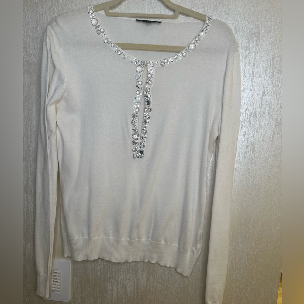 M apostrophe sweater